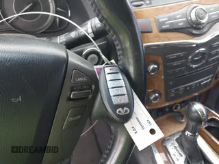 2014 Infiniti QX80 z VIN JN8AZ2NF1E9553024, wystawiony jako IAAI lot #42231679 z przebiegiem 207 618 mil mil oraz . Historia ofert i sprzedaży dostępna na DreamBid. Obrazek 11.