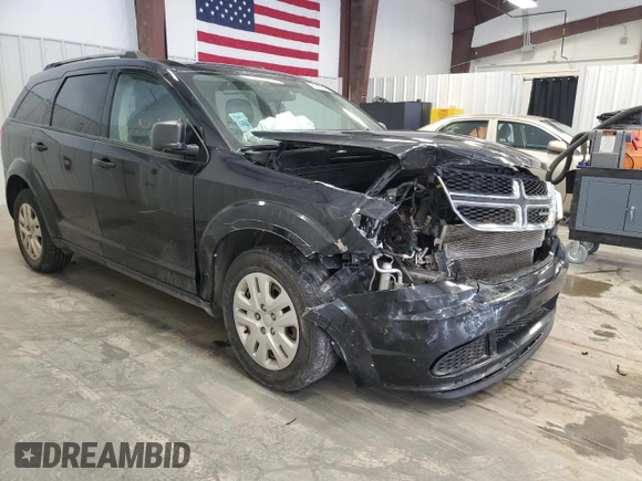 2017 Dodge Journey SE with VIN 3C4PDCAB4HT704902, listed as a Copart auction lot 51410815 with 153,976 mi miles and Salvage Title. Bid and sale history available at DreamBid. Image 4.