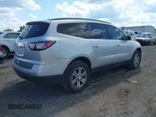 2015 Chevrolet Traverse LT with VIN 1GNKRHKD1FJ359123, listed as a IAAI auction lot 42247341 with 180,189 mi miles and . Bid and sale history available at DreamBid. Image 4.