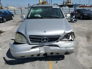 2001 Mercedes-Benz M 320/430/500 z VIN 4JGAB54E71A270139, wystawiony jako Copart lot #57175625 z przebiegiem 154 870 mil mil oraz Szkoda całkowita • Salvage title. Historia ofert i sprzedaży dostępna na DreamBid. Obrazek 5.