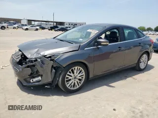 2017 Ford Focus Titanium z VIN 1FADP3J20HL253446, wystawiony jako Copart lot #64196895 z przebiegiem 150 633 mil mil oraz Szkoda całkowita • Salvage title. Historia ofert i sprzedaży dostępna na DreamBid. Obrazek 1.