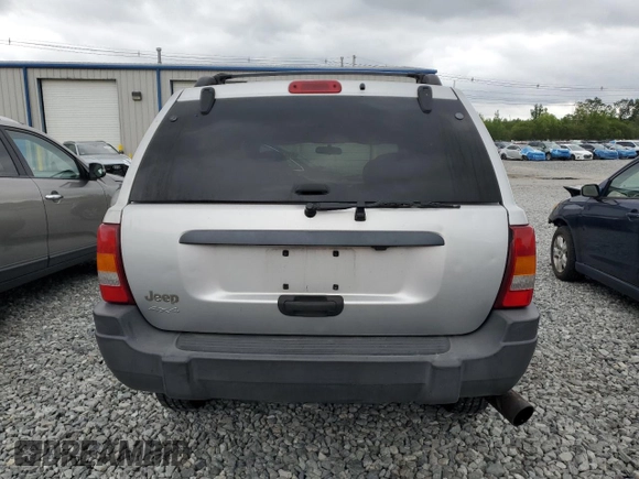 2004 Jeep Grand Cherokee Laredo with VIN 1J4GW48S44C203546, listed as a Copart auction lot 61270315 with 161,534 mi miles and Clean title. Bid and sale history available at DreamBid. Image 6.