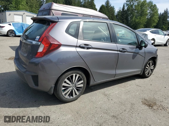 2015 Honda Fit EX-L with VIN 3HGGK5H80FM767970, listed as a Copart auction lot 55866075 with 64,435 mi miles and Salvage Title. Bid and sale history available at DreamBid. Image 3.