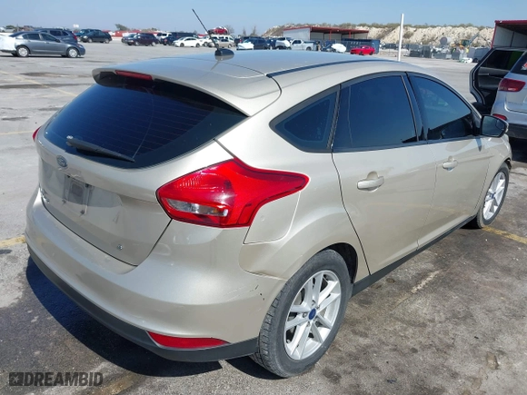 2017 Ford Focus SE with VIN 1FADP3K20HL215777, listed as a IAAI auction lot 41597028 with 137,248 mi miles. Bid and sale history available at carsss.com. Image 4.