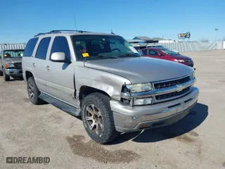 2005 Chevrolet Tahoe LT with VIN 1GNEC13T85J254296, listed as a IAAI auction lot 41676900 with 214,305 mi miles. Bid and sale history available at carsss.com. Image 1.