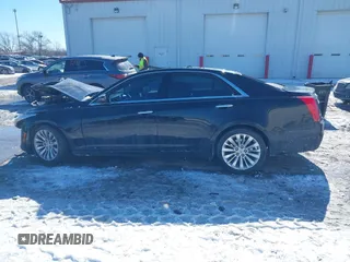 2014 Cadillac CTS Luxury AWD with VIN 1G6AX5SX3E0191673, listed as a IAAI auction lot 41617087 with 68,581 mi miles and . Bid and sale history available at DreamBid. Image 14.