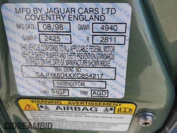 1999 Jaguar XJ with VIN SAJHX604XXC854217, listed as a Copart auction lot 56042735 with 127,092 mi miles and Salvage title. Bid and sale history available at DreamBid. Image 12.