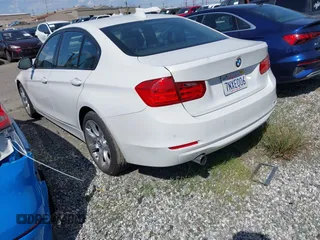 2015 BMW 3 Series 320i with VIN WBA3B1G56FNT06434, listed as a IAAI auction lot 41772918 with 76,782 mi miles. Bid and sale history available at carsss.com. Image 3.