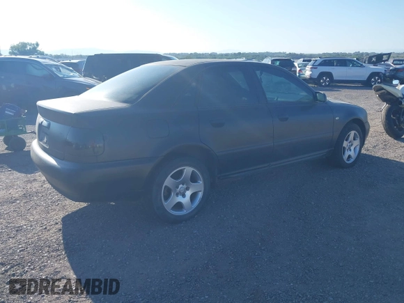 2001 Audi A4 z VIN WAUAH68D41A112784, wystawiony jako IAAI lot #40227904 z przebiegiem 188 292 mil mil oraz . Historia ofert i sprzedaży dostępna na DreamBid. Obrazek 4.