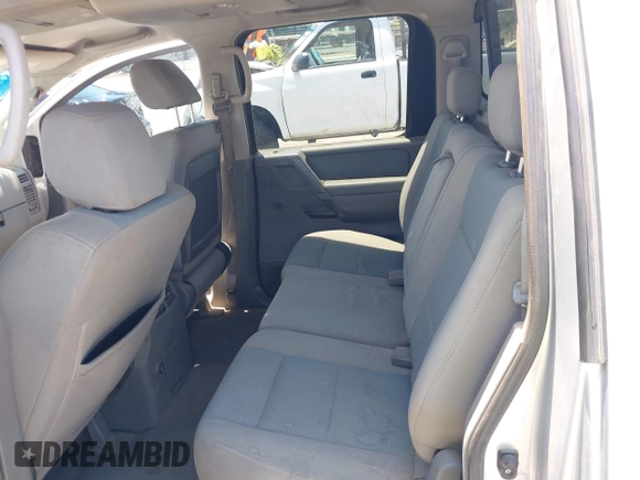 2007 Nissan Titan XE with VIN 1N6AA07A57N200866, listed as a IAAI auction lot 42563440 with 193,188 mi miles and . Bid and sale history available at DreamBid. Image 8.