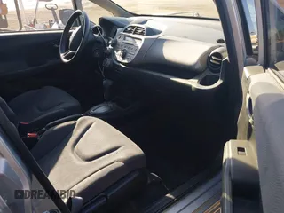2013 Honda Fit with VIN JHMGE8H39DC055353, listed as a IAAI auction lot 41986501 with 159,569 mi miles. Bid and sale history available at carsss.com. Image 5.