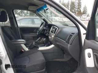 2005 Mazda Tribute LX with VIN 4F2CZ94105KM25420, listed as a IAAI auction lot 41450750 with 148,736 mi miles. Bid and sale history available at carsss.com. Image 5.