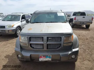 2011 Dodge Nitro Heat with VIN 1D4PU4GX2BW607498, listed as a IAAI auction lot 41685631 with 124,556 mi miles. Bid and sale history available at carsss.com. Image 6.