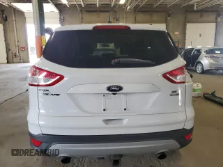 2014 Ford Escape SE z VIN 1FMCU9G99EUC65683, wystawiony jako Copart lot #60923565 z przebiegiem 195 340 mil mil oraz Szkoda całkowita • Salvage title. Historia ofert i sprzedaży dostępna na DreamBid. Obrazek 6.