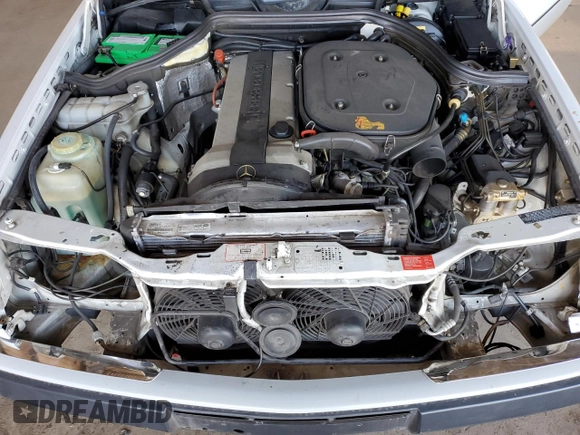 1991 Mercedes-Benz 300 CE с VIN WDBEA51D3MB285660, выставлен на аукционе Copart как лот 49656285 с пробегом 93 772 миль миль и Списание • Salvage title. История ставок и продаж доступна на DreamBid. Изображение 11.