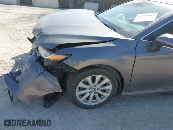 2019 Toyota Camry LE with VIN 4T1B11HK9KU810347, listed as a IAAI auction lot 41804007 with 75,063 mi miles and . Bid and sale history available at DreamBid. Image 19.