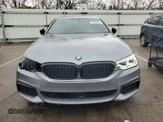 2018 BMW 5 Series M550i xDrive with VIN WBAJB9C54JB286707, listed as a Copart auction lot 49158435 with 74,307 mi miles and Salvage title. Bid and sale history available at DreamBid. Image 5.