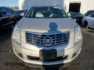 2014 Cadillac SRX Premium Collection z VIN 3GYFNGE34ES687663, wystawiony jako Copart lot #85854534 z przebiegiem 193 653 mil mil oraz Szkody całkowita. Historia ofert i sprzedaży dostępna na DreamBid. Obrazek 5.