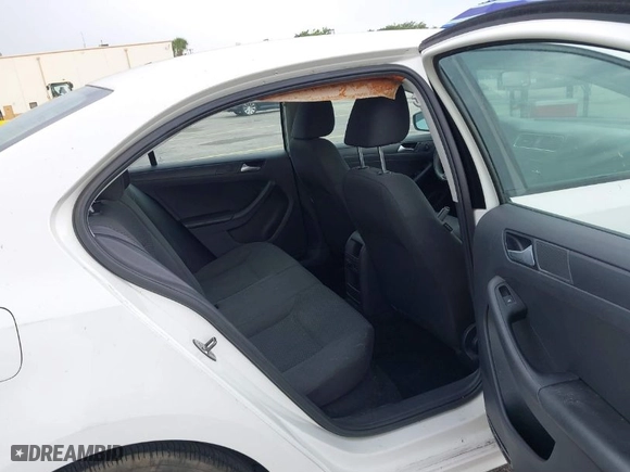 2014 Volkswagen Jetta Sedan S with VIN 3VW2K7AJ8EM375364, listed as a IAAI auction lot 41879370 with 117,259 mi miles. Bid and sale history available at carsss.com. Image 8.
