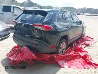 2019 Toyota RAV4 LE with VIN 2T3H1RFV3KC015535, listed as a IAAI auction lot 41999076 with 99,375 mi miles and . Bid and sale history available at DreamBid. Image 4.