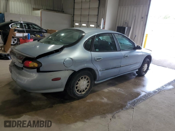 1997 Ford Taurus LX with VIN 1FALP53S8VA114239, listed as a Copart auction lot 56534025 with 110,834 mi miles and Salvage title. Bid and sale history available at DreamBid. Image 3.
