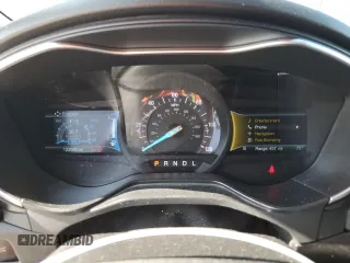 2019 Ford Fusion Titanium with VIN 3FA6P0RU1KR209297, listed as a Copart auction lot 54358065 with 122,600 mi miles and Salvage Title. Bid and sale history available at DreamBid. Image 9.