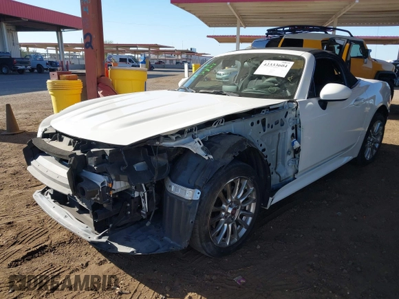 2018 FIAT 124 Spider Abarth z VIN JC1NFAEK9J0137571, wystawiony jako IAAI lot #42333604 z przebiegiem 31 532 mil mil oraz . Historia ofert i sprzedaży dostępna na DreamBid. Obrazek 18.