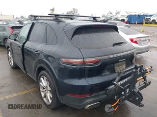 2021 Porsche Cayenne z VIN WP1AA2AY6MDA00356, wystawiony jako IAAI lot #41468711 z przebiegiem 73 329 mil mil oraz . Historia ofert i sprzedaży dostępna na DreamBid. Obrazek 3.