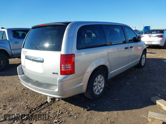 2008 Chrysler Town & Country LX with VIN 2A8HR44H38R115587, listed as a IAAI auction lot 41035823 with 167,564 mi miles and . Bid and sale history available at DreamBid. Image 4.