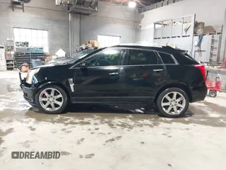 2012 Cadillac SRX Performance Collection z VIN 3GYFNEE37CS630391, wystawiony jako IAAI lot #42280516 z przebiegiem 137 330 mil mil oraz . Historia ofert i sprzedaży dostępna na DreamBid. Obrazek 14.