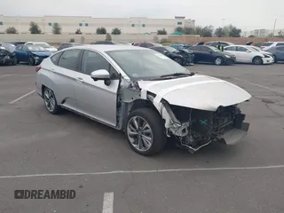 2019 Honda Clarity Plug-In Hybrid Touring with VIN JHMZC5F34KC007031, listed as a IAAI auction lot 41763881 with 87,490 mi miles. Bid and sale history available at carsss.com. Image 1.
