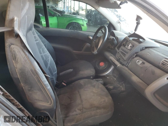 2010 Smart fortwo Pure с VIN WMEEJ3BA1AK360041, выставлен на аукционе Copart как лот 59594055 с пробегом Не указан миль и Списание • Salvage title. История ставок и продаж доступна на DreamBid. Изображение 10.