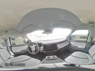 2024 Rivian R1T Adventure z VIN 7FCTGCAA1RN030829, wystawiony jako Copart lot #81459854 z przebiegiem Nie podano mil oraz Szkody całkowita. Historia ofert i sprzedaży dostępna na DreamBid. Obrazek 14.