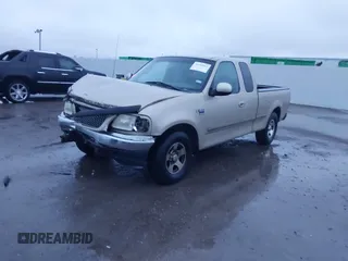 1999 Ford F-150 XL with VIN 1FTRX17L1XNA06282, listed as a IAAI auction lot 41545503 with 234,817 mi miles. Bid and sale history available at carsss.com. Image 2.