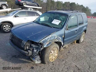 2006 Mercury Mariner Luxury with VIN 4M2CU57186DJ07953, listed as a IAAI auction lot 41756840 with 163,988 mi miles. Bid and sale history available at carsss.com. Image 2.