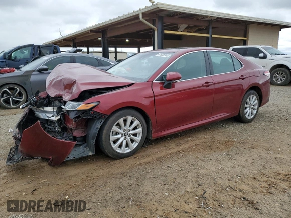 2019 Toyota Camry LE with VIN 4T1B11HKXKU779304, listed as a Copart auction lot 47935945 with 59,277 mi miles and Salvage Title. Bid and sale history available at carsss.com. Image 1.