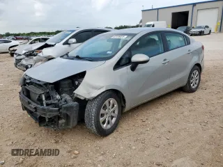 2013 Kia Rio EX with VIN KNADN4A38D6303580, listed as a Copart auction lot 63126825 with 103,675 mi miles and Salvage title. Bid and sale history available at DreamBid. Image 1.