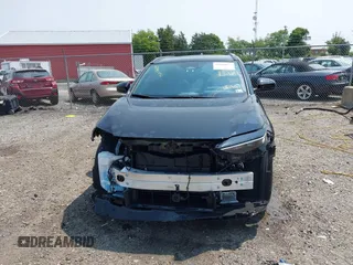 2024 Toyota bZ4X XLE with VIN JTMABACA7RA061457, listed as a IAAI auction lot 42395872 with 16,558 mi miles and . Bid and sale history available at DreamBid. Image 13.