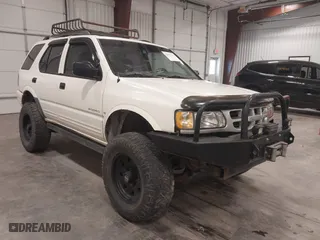 1998 Isuzu Rodeo S with VIN 4S2CM58W8W4363868, listed as a IAAI auction lot 42073264 with 204,885 mi miles. Bid and sale history available at carsss.com. Image 1.