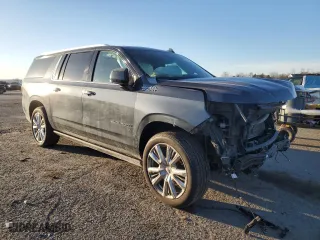 2021 Chevrolet Suburban High Country with VIN 1GNSKGKL0MR100370, listed as a Copart auction lot 42916425 with 100,541 mi miles and Salvage Title. Bid and sale history available at carsss.com. Image 4.