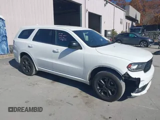 2018 Dodge Durango SXT with VIN 1C4RDJAG5JC187488, listed as a IAAI auction lot 40630773 with 212,501 mi miles and . Bid and sale history available at DreamBid. Image 1.