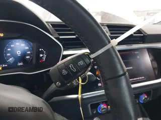 2020 Audi Q3 Premium with VIN WA1AECF3XL1090825, listed as a IAAI auction lot 42541577 with 32,432 mi miles and . Bid and sale history available at DreamBid. Image 11.