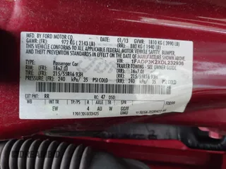 2013 Ford Focus SE with VIN 1FADP3K2XDL232936, listed as a IAAI auction lot 41898606 with 145,759 mi miles. Bid and sale history available at carsss.com. Image 9.