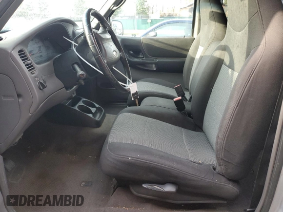 2003 Ford Ranger XL with VIN 1FTYR14U43PB50930, listed as a Copart auction lot 55161185 with 213,771 mi miles and Salvage title. Bid and sale history available at DreamBid. Image 7.
