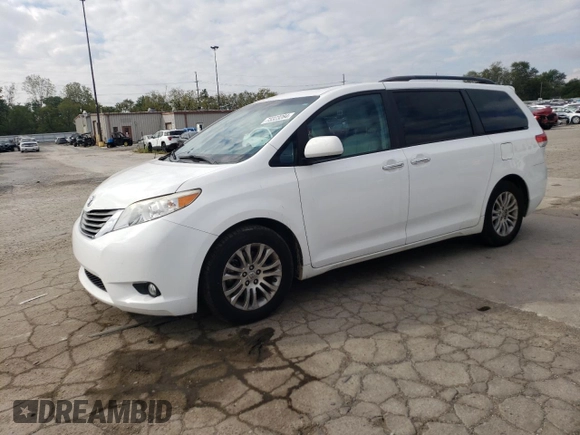 2012 Toyota Sienna XLE AAS with VIN 5TDYK3DC0CS250830, listed as a Copart auction lot 73323284 with 147,580 mi miles and Salvage Title. Bid and sale history available at DreamBid. Image 1.