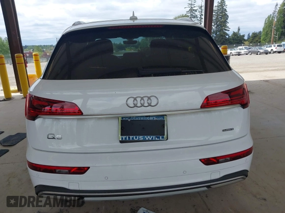 2021 Audi Q5 Premium Plus z VIN WA1BAAFY5M2004171, wystawiony jako IAAI lot #42140899 z przebiegiem 62 544 mil mil oraz . Historia ofert i sprzedaży dostępna na DreamBid. Obrazek 17.
