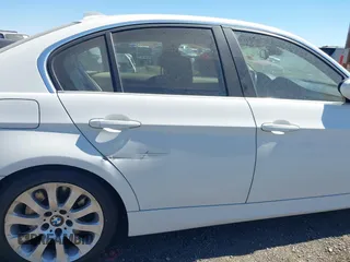 2006 BMW 3 Series 330i with VIN WBAVB335X6KS37226, listed as a IAAI auction lot 40297948 with 186,788 mi miles. Bid and sale history available at carsss.com. Image 6.