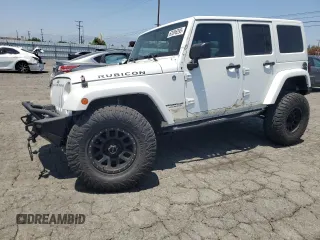 2015 Jeep Wrangler Unlimited Rubicon z VIN 1C4BJWFG3FL771508, wystawiony jako Copart lot #62006295 z przebiegiem 108 128 mil mil oraz Szkoda całkowita • Salvage title. Historia ofert i sprzedaży dostępna na DreamBid. Obrazek 1.