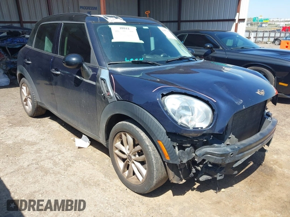 2014 MINI Countryman S with VIN WMWZC3C5XEWP27221, listed as a IAAI auction lot 41957817 with 112,353 mi miles and . Bid and sale history available at DreamBid. Image 1.