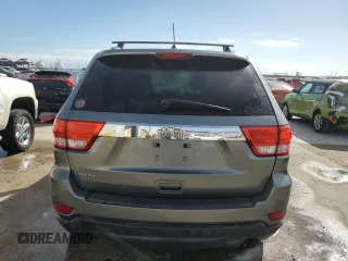 2012 Jeep Grand Cherokee Laredo with VIN 1C4RJEAG1CC306950, listed as a Copart auction lot 84912434 with 128,659 mi miles and Salvage Title. Bid and sale history available at carsss.com. Image 6.